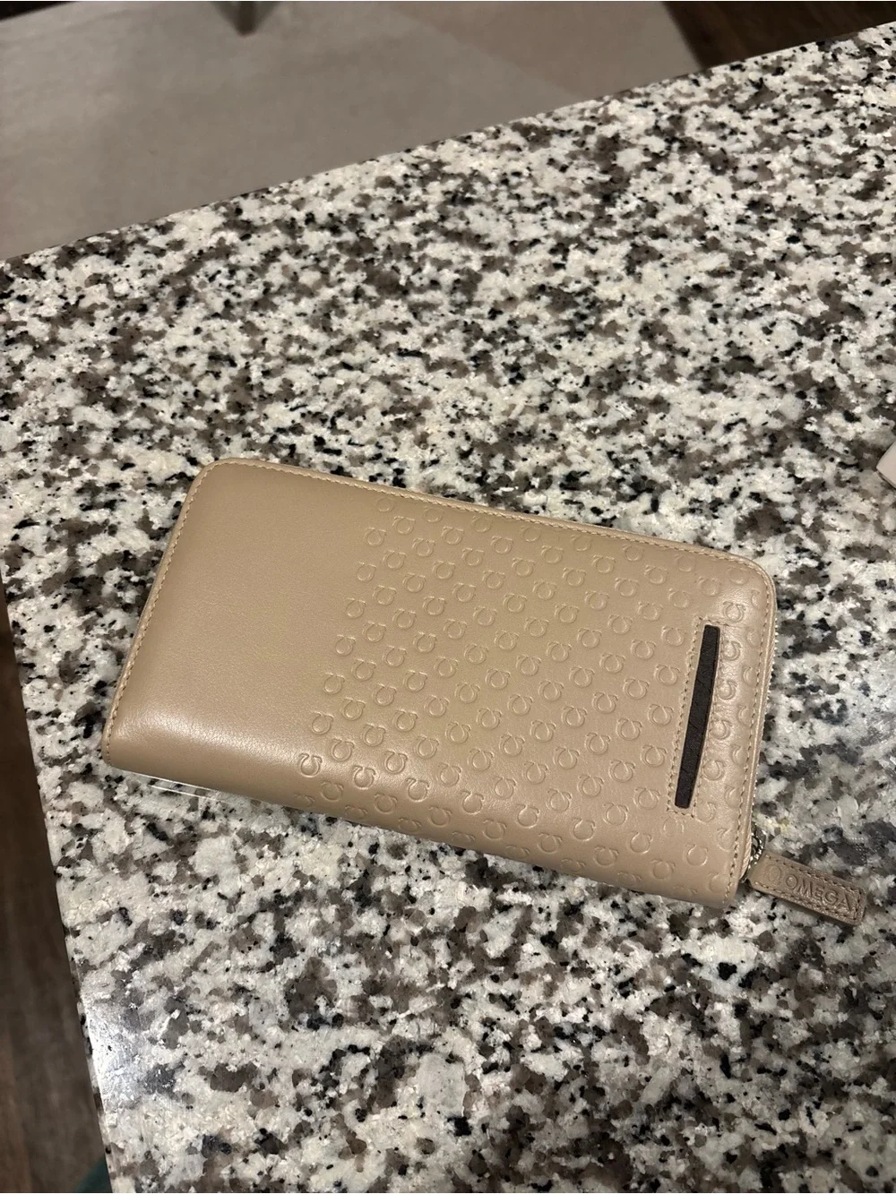 Omega boutique monogrammed